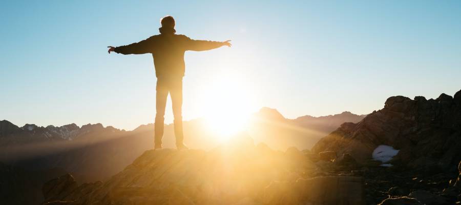 figure on mountain, representing free online writing course on story structure