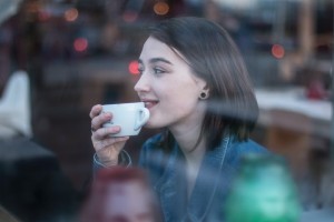 woman in café, representing fictional character development woman in café, representing fictional character development