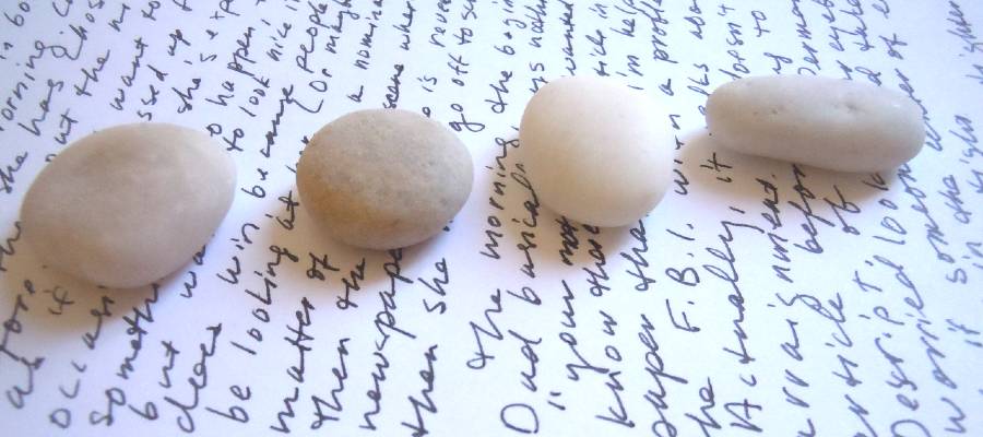 creative writing journal with line of stones on top creative writing journal with line of stones on top