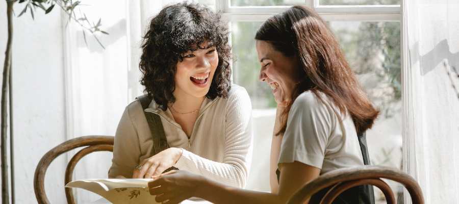 two women talking two women talking