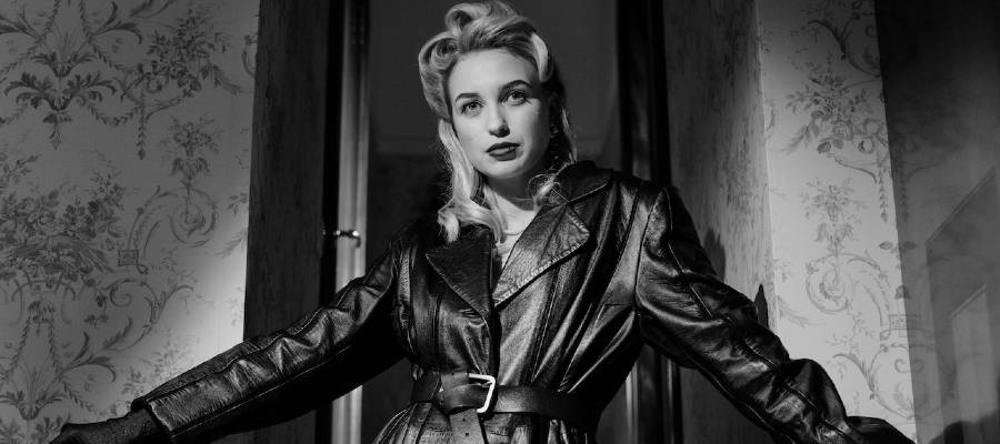 woman dressed as femme fatale from old movie