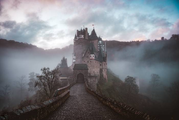 misty castle, illustrating a guide to how to write fantasy