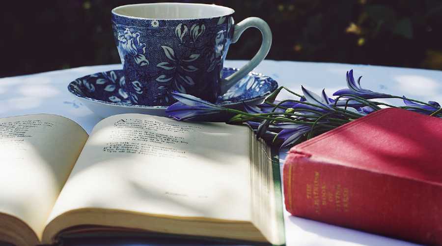 poetry books and coffee mug