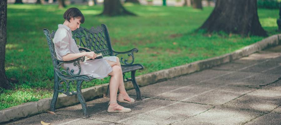 woman with book, representing creative writing