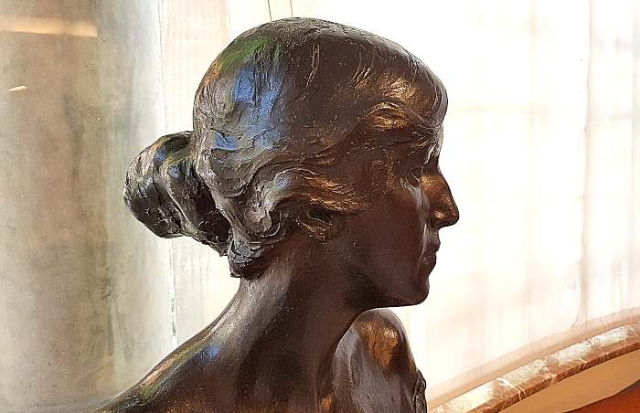 statue of contemplative woman
