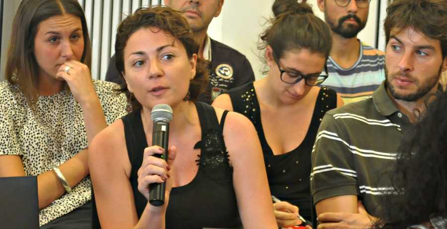 woman speaking, representing the idea of a narrator