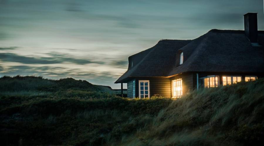 house with lighted windows