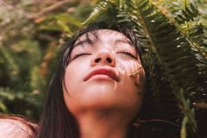 woman resting with eyes closed, to illustrate article with tips for writers woman resting with eyes closed, to illustrate article with tips for writers